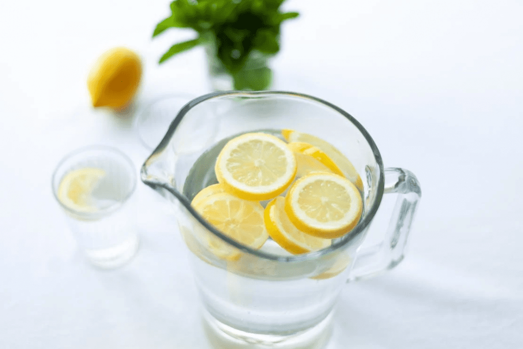 Image showing adding lemon to your water to help decrease cramping