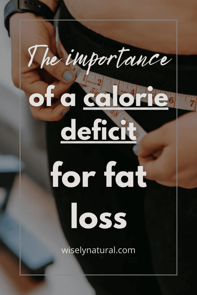Women measuring fat loss in a calorie deficit