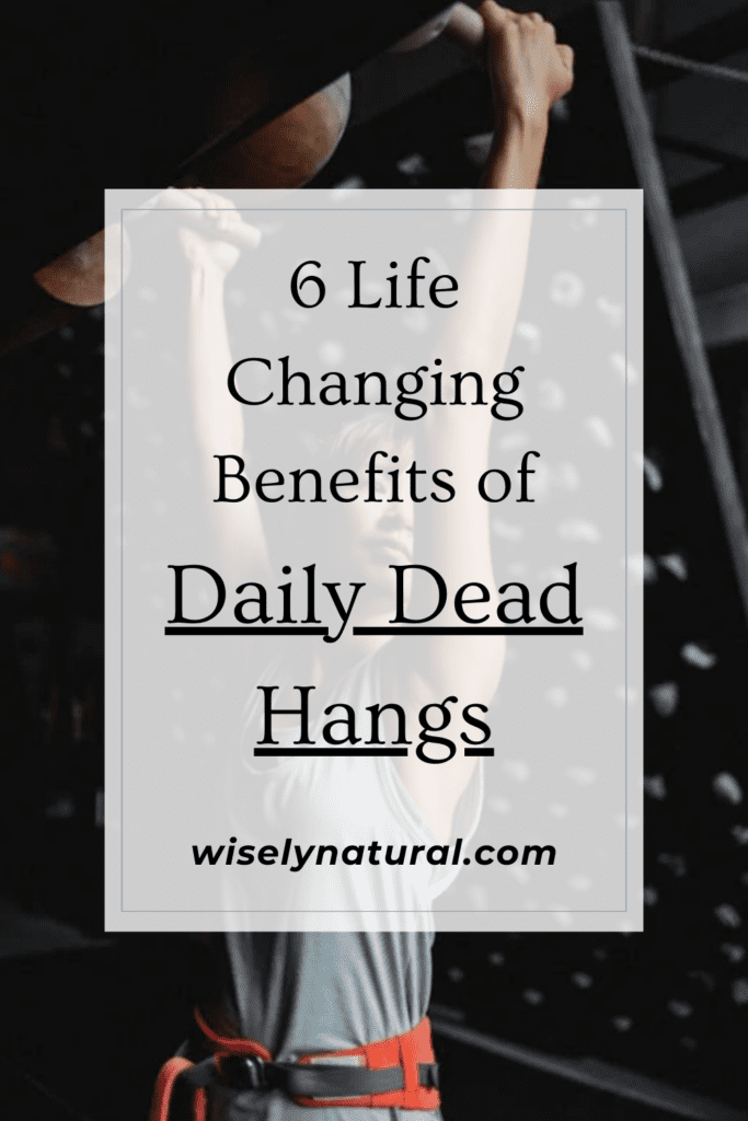 Woman performing a dead hang and the major benefits of daily dead hangs.