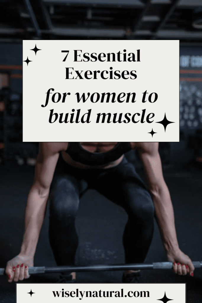 Muscular woman with lean toned muscles lifting a barbell in the gym