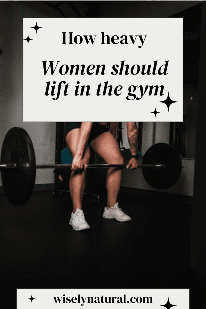 Woman doing barbell rows with heavy weight in the gym